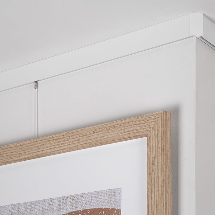 STAS cliprail max picture hanging system provides a seamless ceiling-to-wall connection for perfectionists.