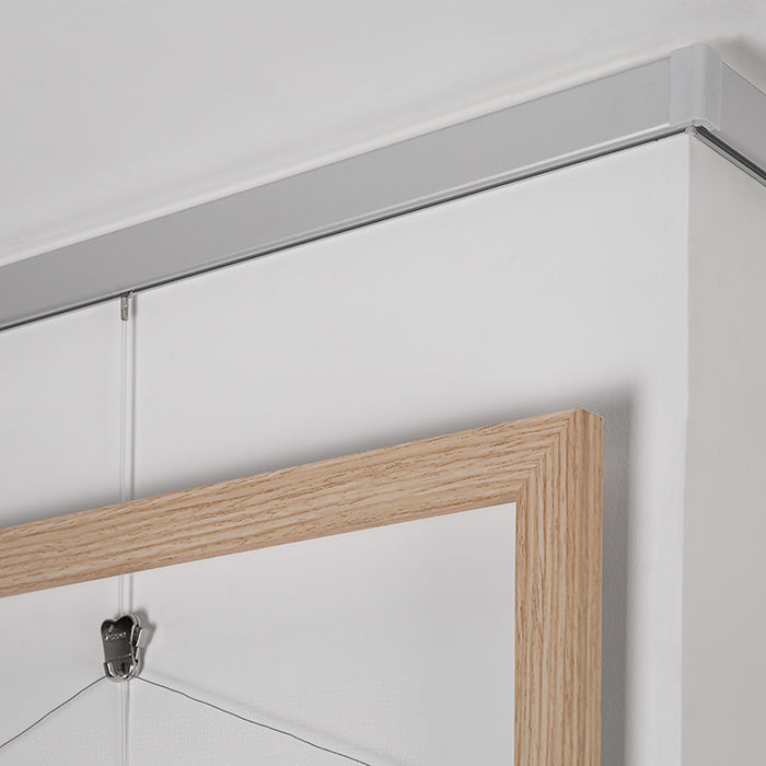 STAS cliprail pro picture rail offers seamless hanging; kit includes screws, plugs; available in white/aluminium.