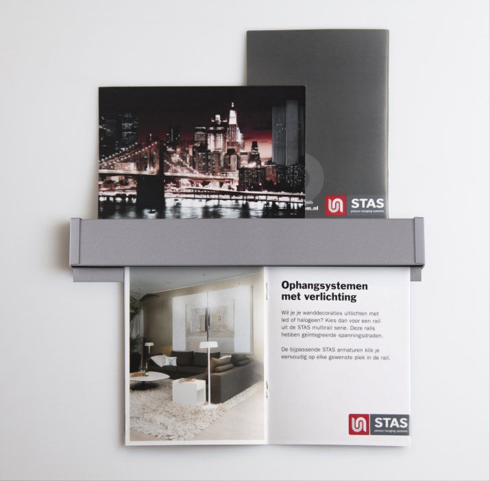 STAS papergrip: Intuitive design; change paper displays quickly; clip magnets, hooks for more use.
